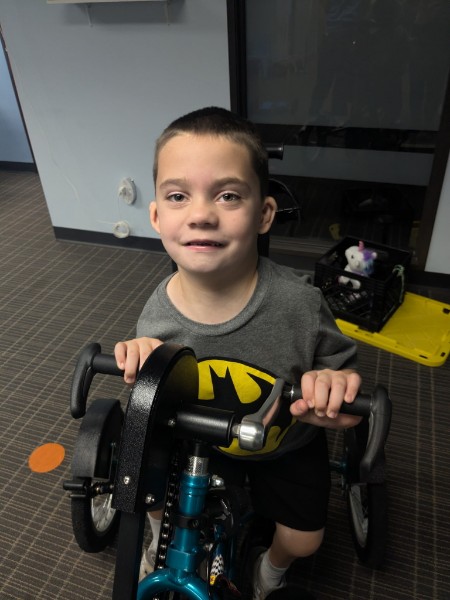 Thomas on his adaptive bike